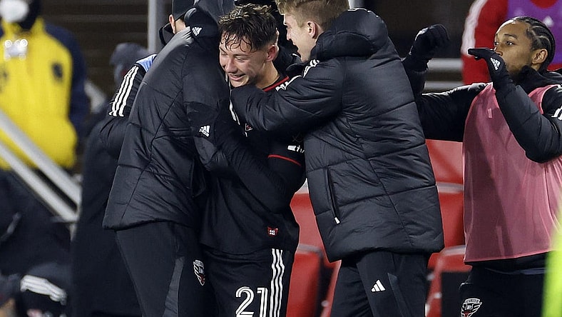 Feb 25, 2023; Washington, District of Columbia, USA; D.C. United forward Theodore Ku-Dipietro (21) reacts after scoring a goal against Toronto FC during the second half at Audi Field. Mandatory Credit: Geoff Burke-USA TODAY Sports