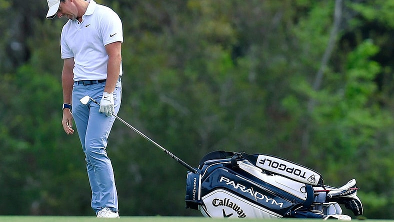 Rory McIlroy drops his head after his shot from the fairway of hole 14 went off the back of the green during first round action of The Players Championship in Ponte Vedra Beach, FL, Thursday, March 9, 2023.

Jki 030923 Bs The Players Thursday 20