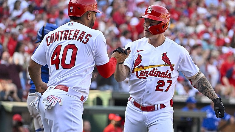 Mar 30, 2023; St. Louis, Missouri, USA;  St. Louis Cardinals center fielder Tyler O'Neill (27) celebrates with catcher Willson Contreras (40) after hitting a two run home run against the Toronto Blue Jays during the third inning at Busch Stadium. Mandatory Credit: Jeff Curry-USA TODAY Sports