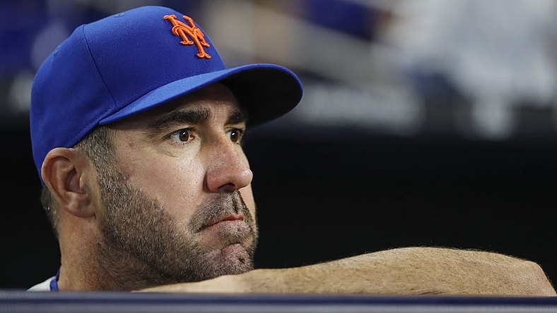 Mar 30, 2023; Miami, Florida, USA; New York Mets starting pitcher Justin Verlander (35) looks on from the dugout prior to the game against the Miami Marlins at loanDepot Park. Mandatory Credit: Sam Navarro-USA TODAY Sports