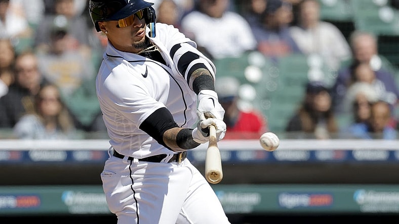 Apr 9, 2023; Detroit, Michigan, USA;  Detroit Tigers shortstop Javier Baez (28) hits a single in the third inning against the Boston Red Sox at Comerica Park. Mandatory Credit: Rick Osentoski-USA TODAY Sports