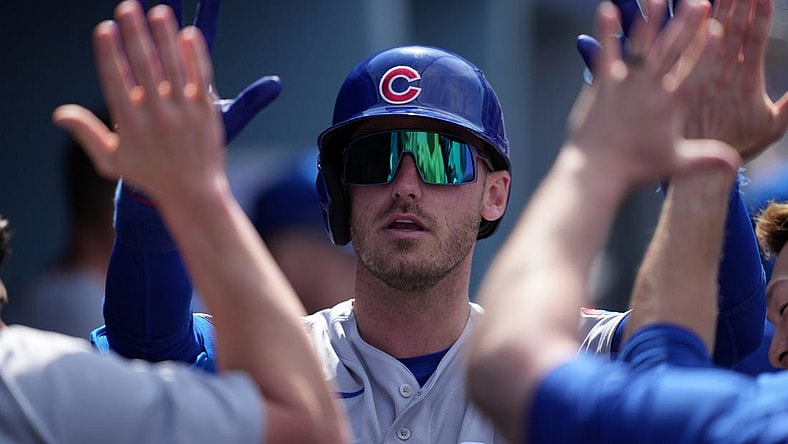 Apr 16, 2023; Los Angeles, California, USA; Chicago Cubs center fielder Cody Bellinger (24) celebrates with teammates after hitting a solo home run in the fifth inning against the Los Angeles Dodgers at Dodger Stadium. Mandatory Credit: Kirby Lee-USA TODAY Sports
