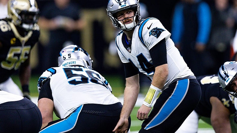 Jan 8, 2023; New Orleans, Louisiana, USA; Carolina Panthers quarterback Sam Darnold (14) drops back to pass against the New Orleans Saints during the first half at Caesars Superdome. Mandatory Credit: Stephen Lew-USA TODAY Sports