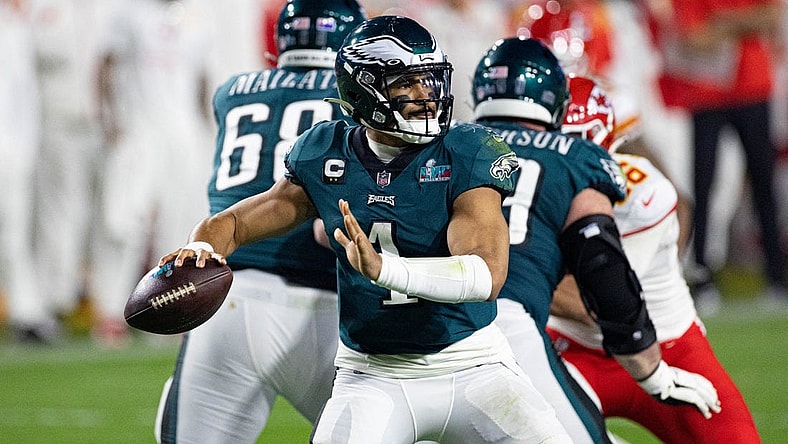 Feb 12, 2023; Glendale, Arizona, US; Philadelphia Eagles quarterback Jalen Hurts (1) throws the ball against the Kansas City Chiefs in Super Bowl LVII at State Farm Stadium. Mandatory Credit: Bill Streicher-USA TODAY Sports