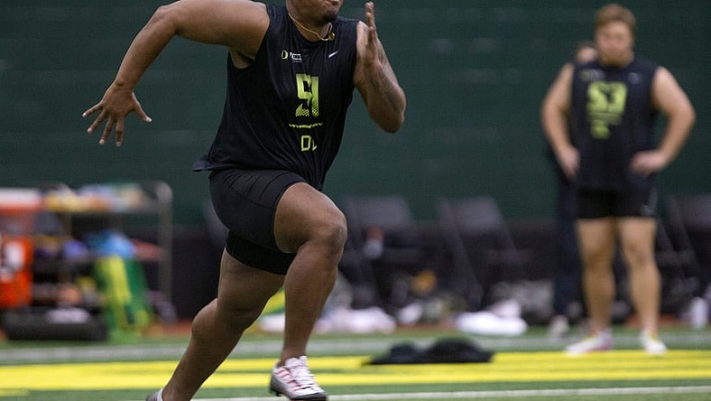 Defensive lineman Jordon Riley runs during Oregon Pro Day at the Moshofsky Center Tuesday March 14, 2023.
Eug 031423 Pro Day 03