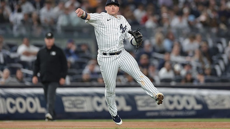 Apr 4, 2023; Bronx, New York, USA; New York Yankees third baseman Josh Donaldson (28) throws the ball to first base for an out during the eighth inning against the Philadelphia Phillies at Yankee Stadium. Mandatory Credit: Vincent Carchietta-USA TODAY Sports