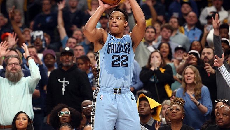 Apr 26, 2023; Memphis, Tennessee, USA; Memphis Grizzlies guard Desmond Bane (22) shoots a three point shot during the second half against the Los Angeles Lakers during game five of the 2023 NBA playoffs at FedExForum. Mandatory Credit: Petre Thomas-USA TODAY Sports