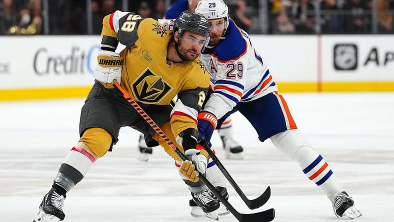 May 3, 2023; Las Vegas, Nevada, USA; Vegas Golden Knights left wing William Carrier (28) jostles with Edmonton Oilers center Leon Draisaitl (29) during a first period face off in game one of the second round of the 2023 Stanley Cup Playoffs at T-Mobile Arena. Mandatory Credit: Stephen R. Sylvanie-USA TODAY Sports