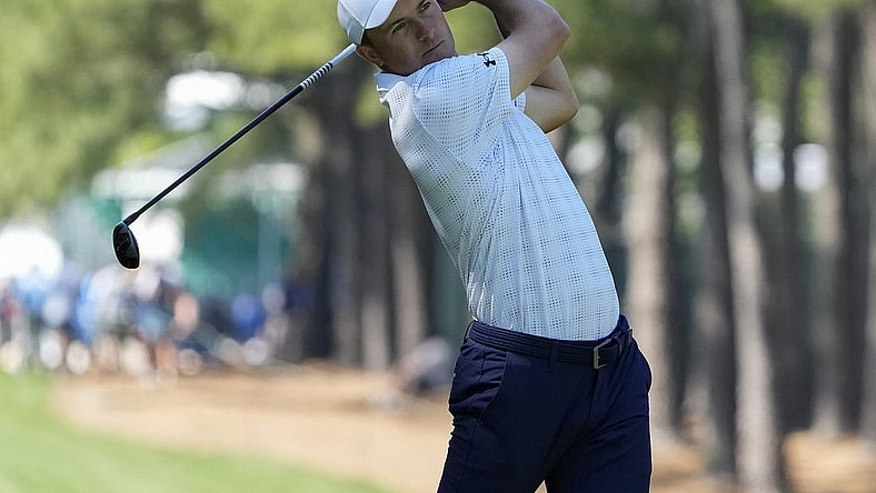 May 4, 2023; Charlotte, North Carolina, USA; Jordan Spieth hits his second shot on ten during the first round of the Wells Fargo Championship golf tournament. Mandatory Credit: Jim Dedmon-USA TODAY Sports