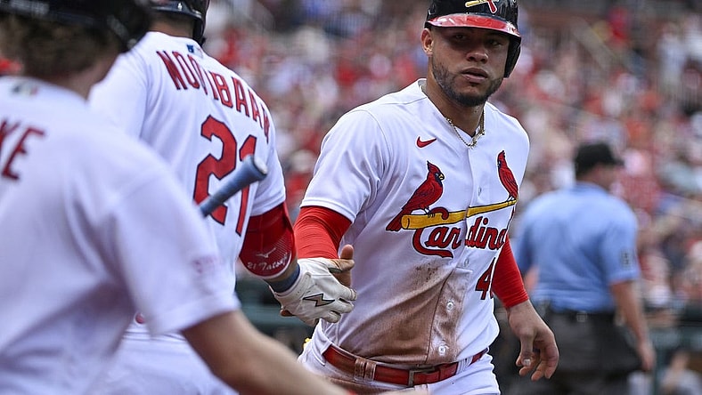 May 7, 2023; St. Louis, Missouri, USA;  St. Louis Cardinals designated hitter Willson Contreras (40) is congratulated by right fielder Lars Nootbaar (21) after scoring against the Detroit Tigers during the second inning at Busch Stadium. Mandatory Credit: Jeff Curry-USA TODAY Sports