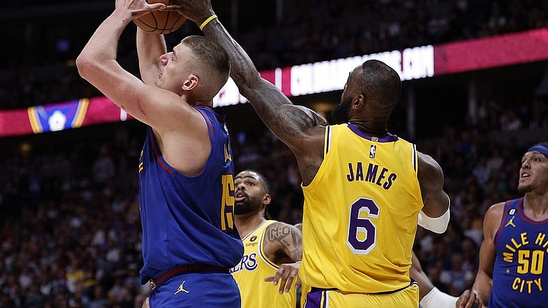 May 16, 2023; Denver, Colorado, USA; Los Angeles Lakers forward LeBron James (6) defends against Denver Nuggets center Nikola Jokic (15) in the second quarter during game one of the Western Conference Finals for the 2023 NBA playoffs at Ball Arena. Mandatory Credit: Isaiah J. Downing-USA TODAY Sports