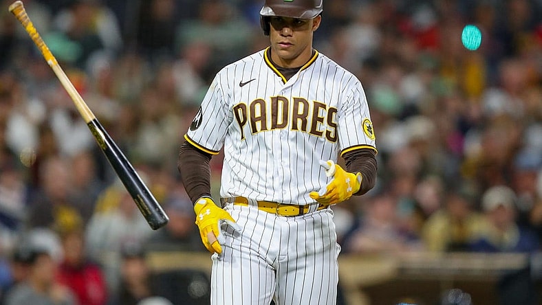 May 20, 2023; San Diego, California, USA; San Diego Padres left fielder Juan Soto (22) throws his bat after drawing a walk in the ninth inning against against the Boston Red Sox at Petco Park. Mandatory Credit: David Frerker-USA TODAY Sports