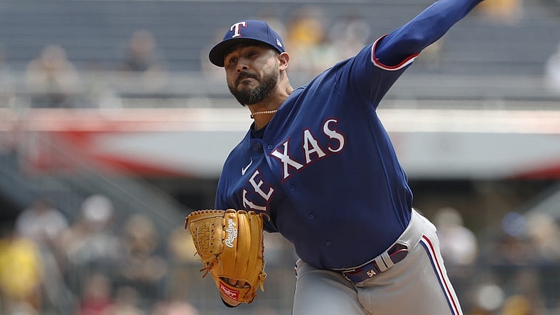 May 24, 2023; Pittsburgh, Pennsylvania, USA; Texas Rangers starting pitcher Martin Perez (54) delivers a pitch against the Pittsburgh Pirates during the first inning at PNC Park. Mandatory Credit: Charles LeClaire-USA TODAY Sports