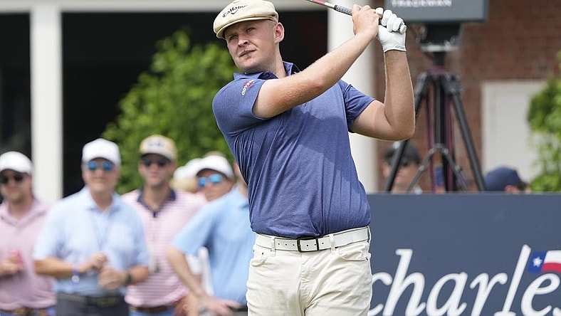 May 26, 2023; Fort Worth, Texas, USA; Harry Hall plays his shot from the 17th tee during the second round of the Charles Schwab Challenge golf tournament. Mandatory Credit: Jim Cowsert-USA TODAY Sports
