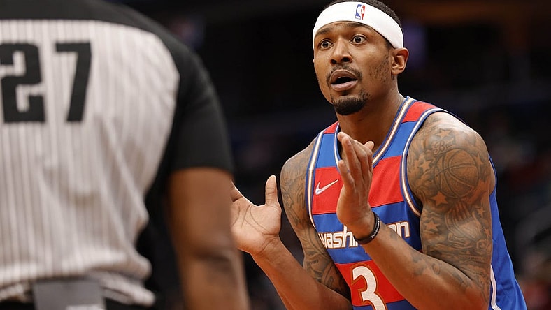Jan 19, 2022; Washington, District of Columbia, USA; Washington Wizards guard Bradley Beal (3) reacts after being called for a foul by referee Mitchell Ervin (27) against the Brooklyn Nets during the first quarter at Capital One Arena. Mandatory Credit: Geoff Burke-USA TODAY Sports