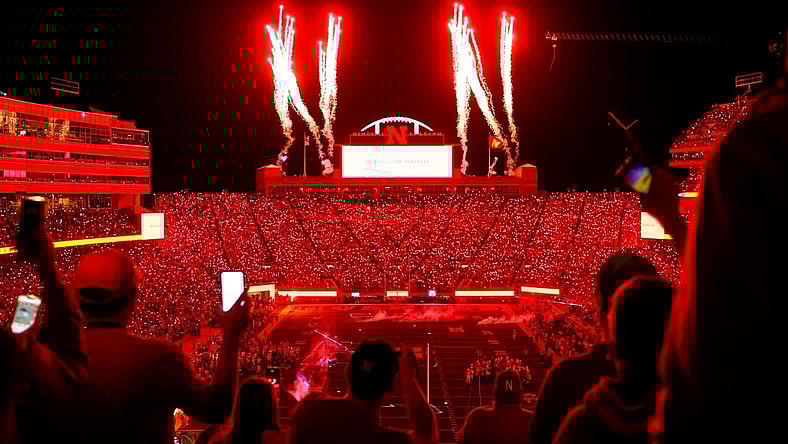 Oct 1, 2022; Lincoln, Nebraska, USA; Fans participate in a light show at the end of the third quarter between the Nebraska Cornhuskers and the Indiana Hoosiers at Memorial Stadium. Mandatory Credit: Dylan Widger-USA TODAY Sports