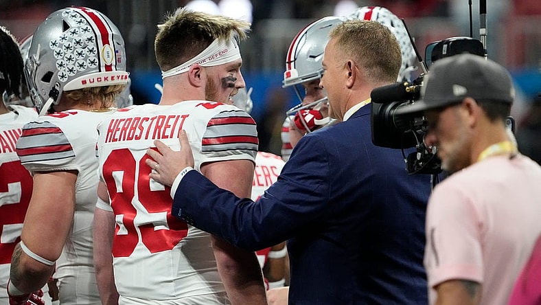 Dec 31, 2022; Atlanta, Georgia, USA; ESPN announcer Kirk Herbstreit talks to his son, Ohio State Buckeyes tight end Zak Herbstreit (89), prior to the Peach Bowl in the College Football Playoff semifinal at Mercedes-Benz Stadium. Mandatory Credit: Adam Cairns-The Columbus Dispatch
Ncaa Football Peach Bowl Ohio State At Georgia
