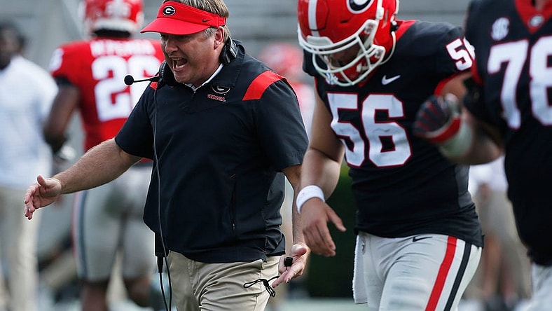 Georgia head coach Kirby Smart speaks with the black team during the UGA G-Day spring football game at Sanford Stadium in Athens on Saturday.
News Joshua L Jones