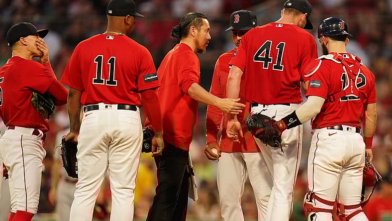 Jun 1, 2023; Boston, Massachusetts, USA; Boston Red Sox manager Alex Cora (13) relieves starting pitcher Chris Sale (41) during a timeout against the Cincinnati Reds in the fourth inning at Fenway Park. Mandatory Credit: David Butler II-USA TODAY Sports