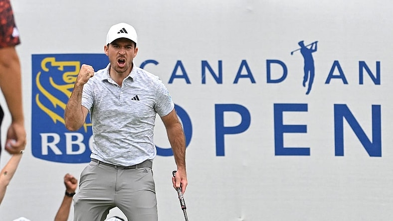 Jun 11, 2023; Toronto, ON, CAN; Nick Taylor reacts after sinking a birdie putt on the 18th green to take the tournament lead during the final round of the RBC Canadian Open golf tournament. Mandatory Credit: Dan Hamilton-USA TODAY Sports