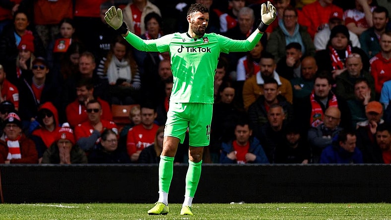 Ben Foster, 40, agreed to return to Wrexham AFC for one more season after the team was promoted to League Two.