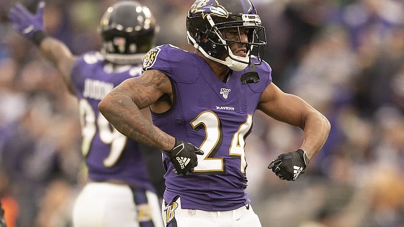 Nov 17, 2019; Baltimore, MD, USA;  Baltimore Ravens cornerback Marcus Peters (24) reacts after breaking up a pass on fourth down against the Houston Texans at M&T Bank Stadium. Mandatory Credit: Tommy Gilligan-USA TODAY Sports
