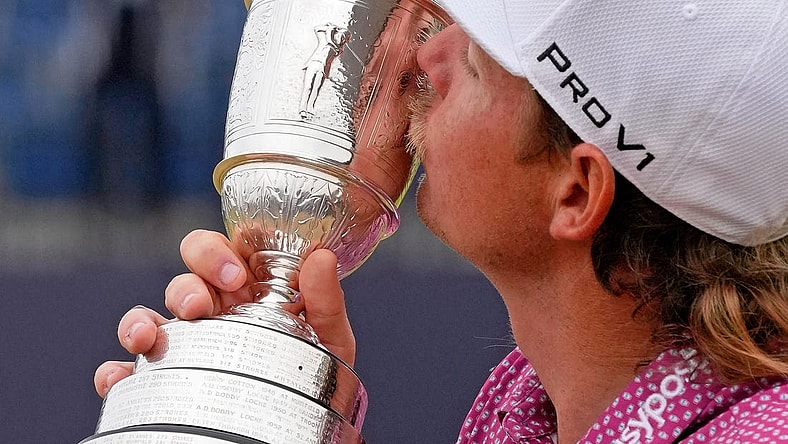 Jul 17, 2022; St. Andrews, SCT; Cameron Smith kisses the claret jug after winning the 150th Open Championship golf tournament at St. Andrews Old Course. Mandatory Credit: Michael Madrid-USA TODAY Sports