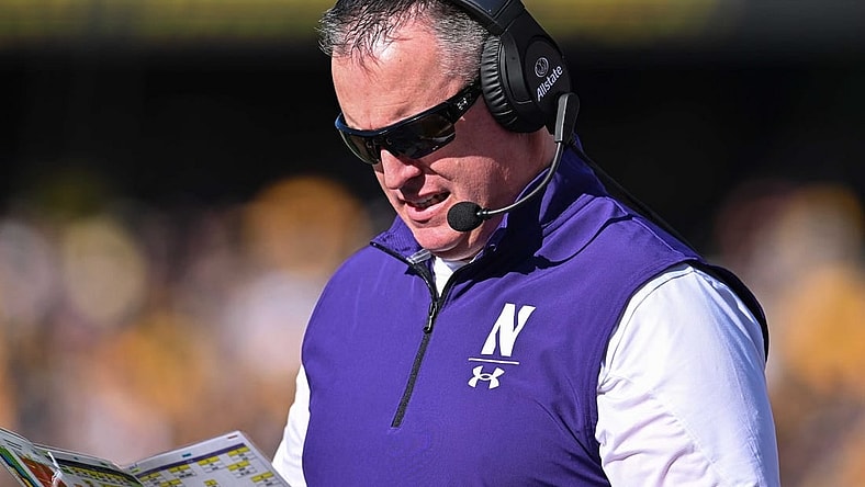 Oct 29, 2022; Iowa City, Iowa, USA; Northwestern Wildcats head coach Pat Fitzgerald looks on during the game against the Iowa Hawkeyes at Kinnick Stadium. Mandatory Credit: Jeffrey Becker-USA TODAY Sports