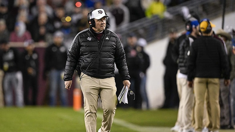 Nov 26, 2022; College Station, Texas, USA; Texas A&M Aggies head coach Jimbo Fisher walks the sidelines during the second quarter against the LSU Tigers at Kyle Field. Mandatory Credit: Jerome Miron-USA TODAY Sports