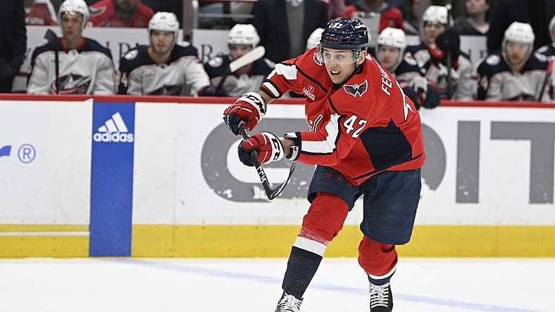 Mar 21, 2023; Washington, District of Columbia, USA; Washington Capitals defenseman Martin Fehervary (42) assists on a goal by Washington Capitals right wing T.J. Oshie (not shown) against the Columbus Blue Jackets during the first period at Capital One Arena. Mandatory Credit: Brad Mills-USA TODAY Sports