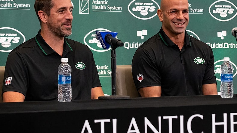 Apr 26, 2023; Florham Park, NJ, USA; New York Jets quarterback Aaron Rodgers (left) and head coach Robert Saleh (right) smile during the introductory press conference at Atlantic Health Jets Training Center. Mandatory Credit: Tom Horak-USA TODAY Sports