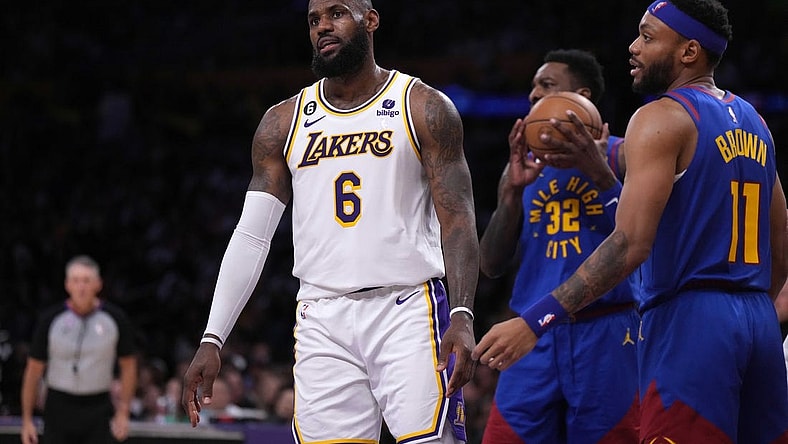 May 20, 2023; Los Angeles, California, USA; Los Angeles Lakers forward LeBron James (6) reacts as Denver Nuggets forward Jeff Green (32) and forward Bruce Brown (11) watch during game three of the Western Conference Finals for the 2023 NBA playoffs at Crypto.com Arena. Mandatory Credit: Kirby Lee-USA TODAY Sports