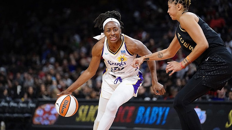 May 27, 2023; Las Vegas, Nevada, USA; Los Angeles Sparks forward Nneka Ogwumike (30) dribbles the ball against Las Vegas Aces forward/center Candace Parker (3) during the third quarter at Michelob Ultra Arena. Mandatory Credit: Lucas Peltier-USA TODAY Sports