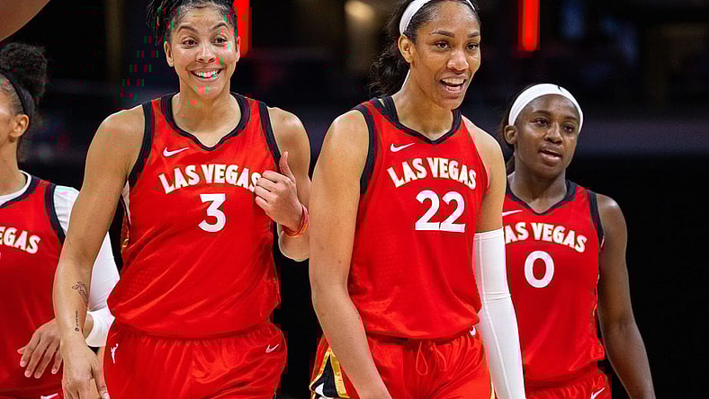 Jun 4, 2023; Indianapolis, Indiana, USA; Las Vegas Aces forward Candace Parker (3) and forward A'ja Wilson (22) celebrates the win against the Indiana Fever at Gainbridge Fieldhouse. Mandatory Credit: Trevor Ruszkowski-USA TODAY Sports