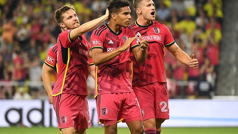 Jun 17, 2023; Nashville, Tennessee, USA; St. Louis City forward Nicholas Gioacchini (11) celebrates with teammates after scoring a goal against Nashville SC during the first half at Geodis Park. Mandatory Credit: Christopher Hanewinckel-USA TODAY Sports