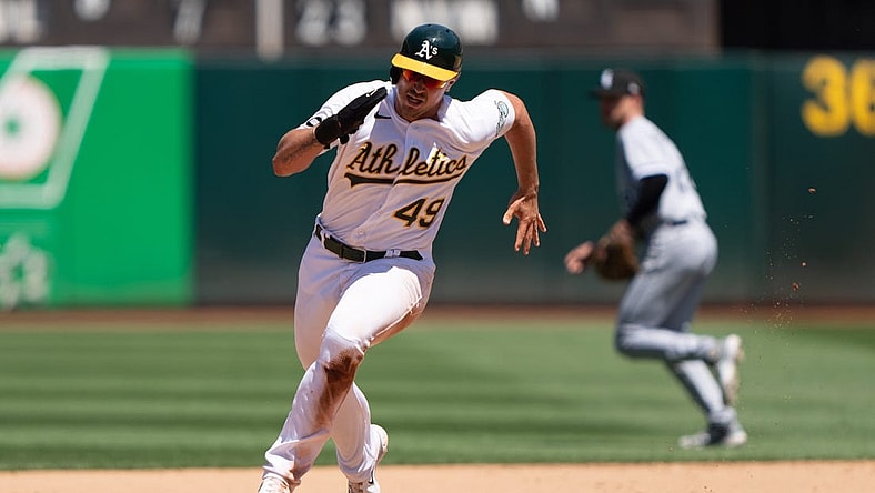 Jul 2, 2023; Oakland, California, USA; Oakland Athletics first baseman Ryan Noda (49) runs during the fifth inning against the Chicago White Sox at Oakland-Alameda County Coliseum. Mandatory Credit: Stan Szeto-USA TODAY Sports