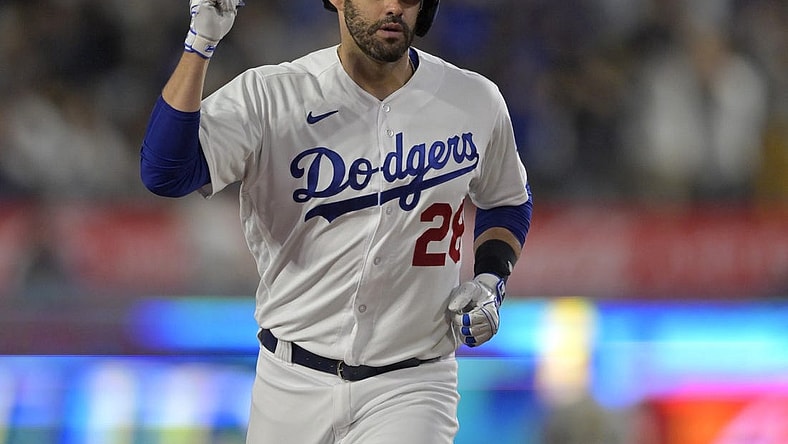 Jul 5, 2023; Los Angeles, California, USA; Los Angeles Dodgers designated hitter J.D. Martinez (28) pumps his fist as he rounds the bases after hitting a three-run home run in the fifth inning against the Pittsburgh Pirates at Dodger Stadium. Mandatory Credit: Jayne Kamin-Oncea-USA TODAY Sports
