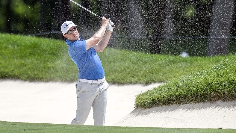 Jul 6, 2023; Silvis, Illinois, USA;  Jonas Blixt hits a shot out of a fairway bunker on the 18th hole during the first round of the John Deere Classic golf tournament. Mandatory Credit: Marc Lebryk-USA TODAY Sports