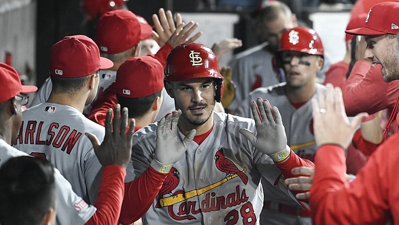 Jul 7, 2023; Chicago, Illinois, USA; St. Louis Cardinals third baseman Nolan Arenado (28) celebrates in the dugout after he hits a two run home run against the Chicago White Sox during the seventh inning at Guaranteed Rate Field. Mandatory Credit: Matt Marton-USA TODAY Sports