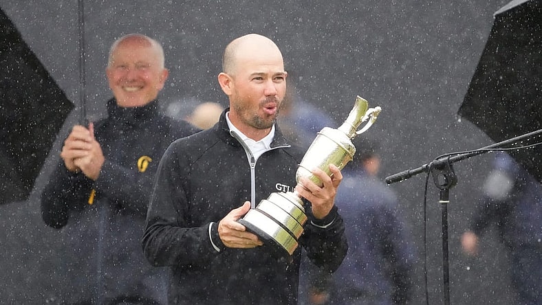 Jul 23, 2023; Hoylake, England, GBR; Brian Harman holds the Claret Jug after winning The Open Championship golf tournament. Mandatory Credit: Kyle Terada-USA TODAY Sports