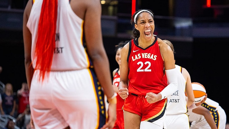 Jun 4, 2023; Indianapolis, Indiana, USA; Las Vegas Aces forward A'ja Wilson (22) celebrates the win against the Indiana Fever  at Gainbridge Fieldhouse. Mandatory Credit: Trevor Ruszkowski-USA TODAY Sports