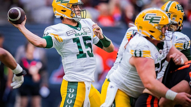 Jun 17, 2023; Vancouver, British Columbia, CAN; Edmonton Elks quarterback Taylor Cornelius (15) makes a pass against the BC Lions in the first half at BC Place. Mandatory Credit: Bob Frid-USA TODAY Sports