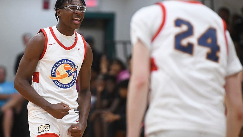 July 3, 2023; North Augusta, S.C., USA; Bryce James (5), son of LeBron James, cheers during the E16 Strive for Greatness and Expressions game at the first day of the Peach Jam at Riverview Park Activities Center. Strive for Greatness defeated Expressions 78-69. Mandatory Credit: Katie Goodale-USA TODAY Network