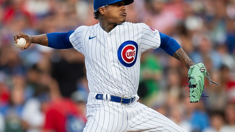 Jul 31, 2023; Chicago, Illinois, USA; Chicago Cubs starting pitcher Marcus Stroman (0) pitches during the first inning against the Cincinnati Reds at Wrigley Field. Mandatory Credit: Patrick Gorski-USA TODAY Sports