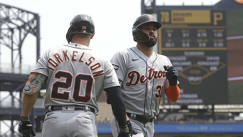 Aug 2, 2023; Pittsburgh, Pennsylvania, USA;  Detroit Tigers first baseman Spencer Torkelson (20) congratulates center fielder Riley Greene (31) crossing home plate on a solo home run against the Pittsburgh Pirates during the first inning at PNC Park. Mandatory Credit: Charles LeClaire-USA TODAY Sports