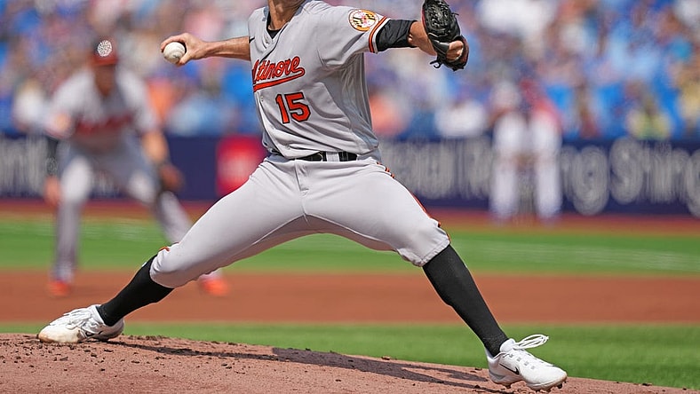 Aug 3, 2023; Toronto, Ontario, CAN; Baltimore Orioles starting pitcher Jack Flaherty (15) throws a pitch against the Toronto Blue Jays during the first inning at Rogers Centre. Mandatory Credit: Nick Turchiaro-USA TODAY Sports