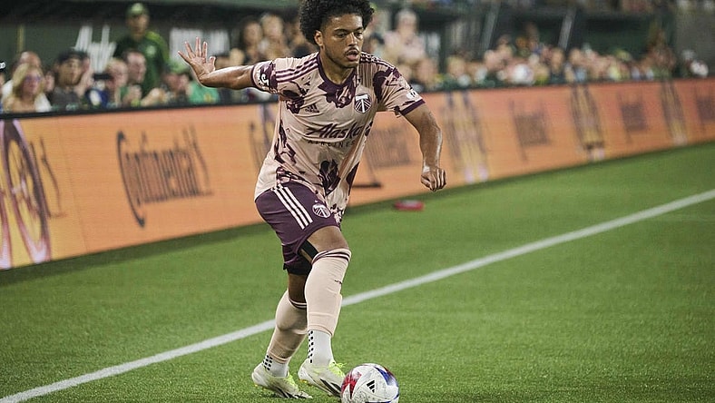 Aug 26, 2023; Portland, Oregon, USA; Portland Timbers midfielder Evander (20) controls the ball during the second half against the Vancouver Whitecaps at Providence Park. Mandatory Credit: Troy Wayrynen-USA TODAY Sports