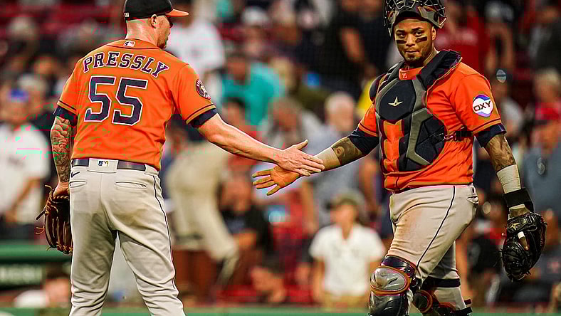 Aug 30, 2023; Boston, Massachusetts, USA; Houston Astros relief pitcher Ryan Pressly (55) and catcher Martin Maldonado (15) congratulate each other after defeating the Boston Red Sox at Fenway Park. Mandatory Credit: David Butler II-USA TODAY Sports