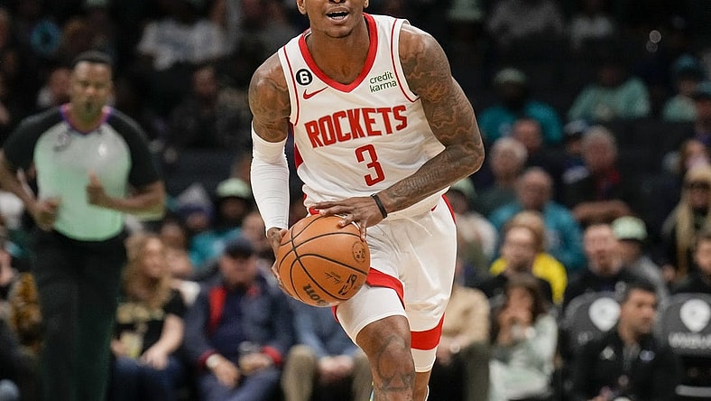 Apr 7, 2023; Charlotte, North Carolina, USA; Houston Rockets guard Kevin Porter Jr. (3) brings the ball up court during the first quarter against the Charlotte Hornets at the Spectrum Center. Mandatory Credit: Jim Dedmon-USA TODAY Sports