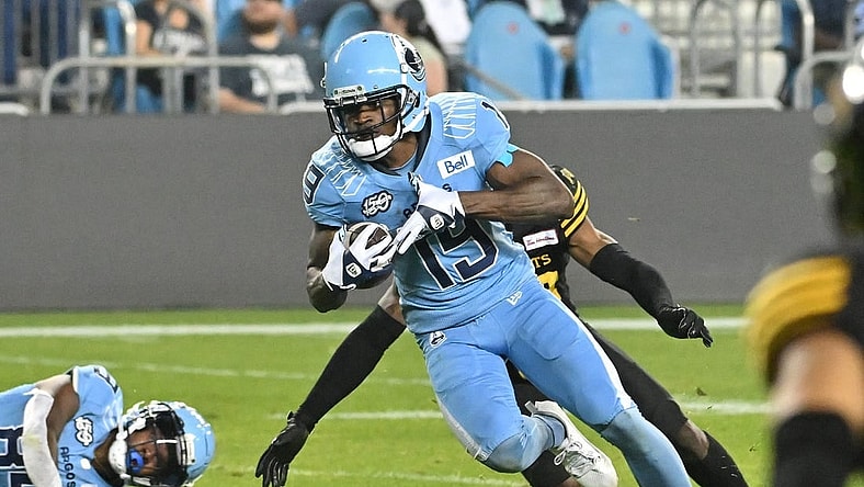 Jun 18, 2023; Toronto, Ontario, CAN; Toronto Argonauts wide receiver Kurleigh Gittens Jr. (19) runs with the ball after catching a pass against the Hamilton Tiger-Cats in the fourth quarter at BMO Field. Mandatory Credit: Dan Hamilton-USA TODAY Sports